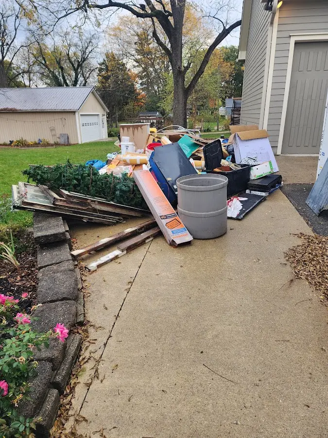 Dumpster being loaded with debris for Commercial Dumpster Rental in Canal Winchester